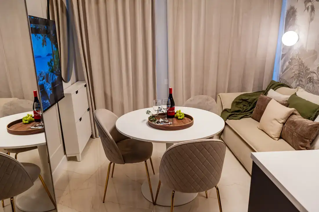 Dining table by the curtains
